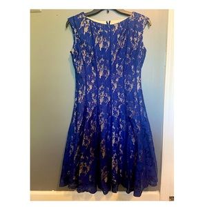 Blue lace dress over cream